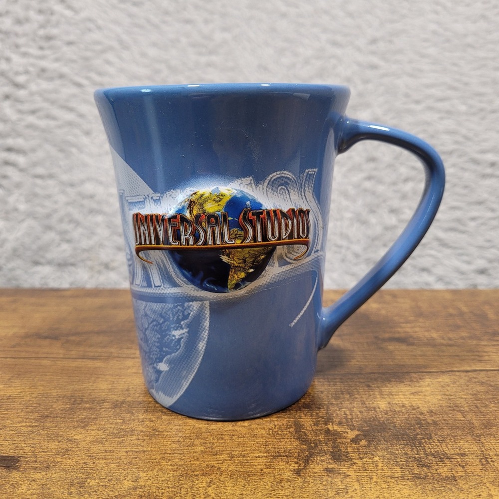 Universal‎ Studios Coffee Mug Blue Raised Logo Graphic Ceramic 2009 Souvenir